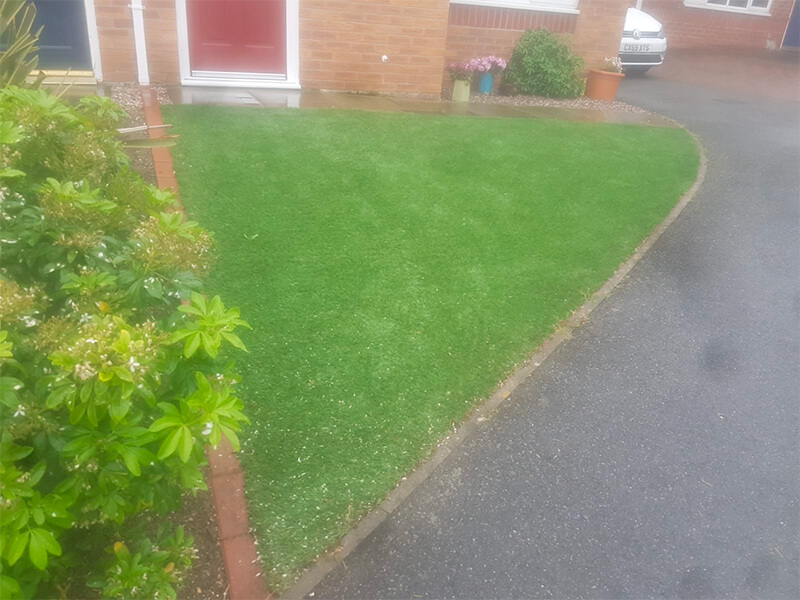Artificial turf in front of house