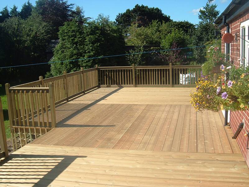 Raised wooden decking in back garden